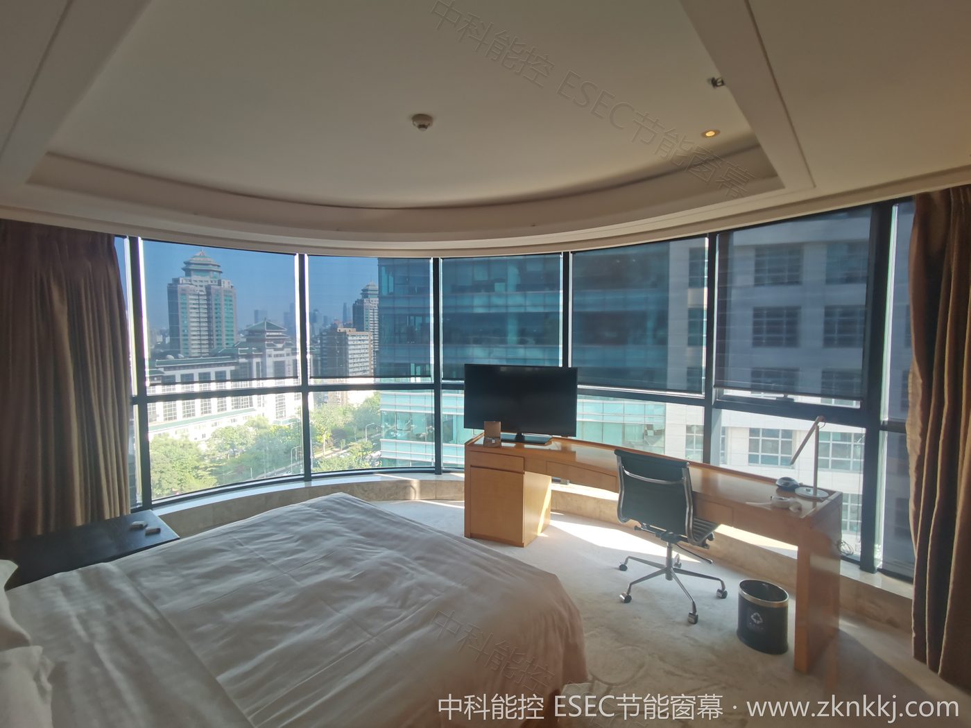 Hotel guest room after installation: with the window curtain lowered, the light is soft and clear