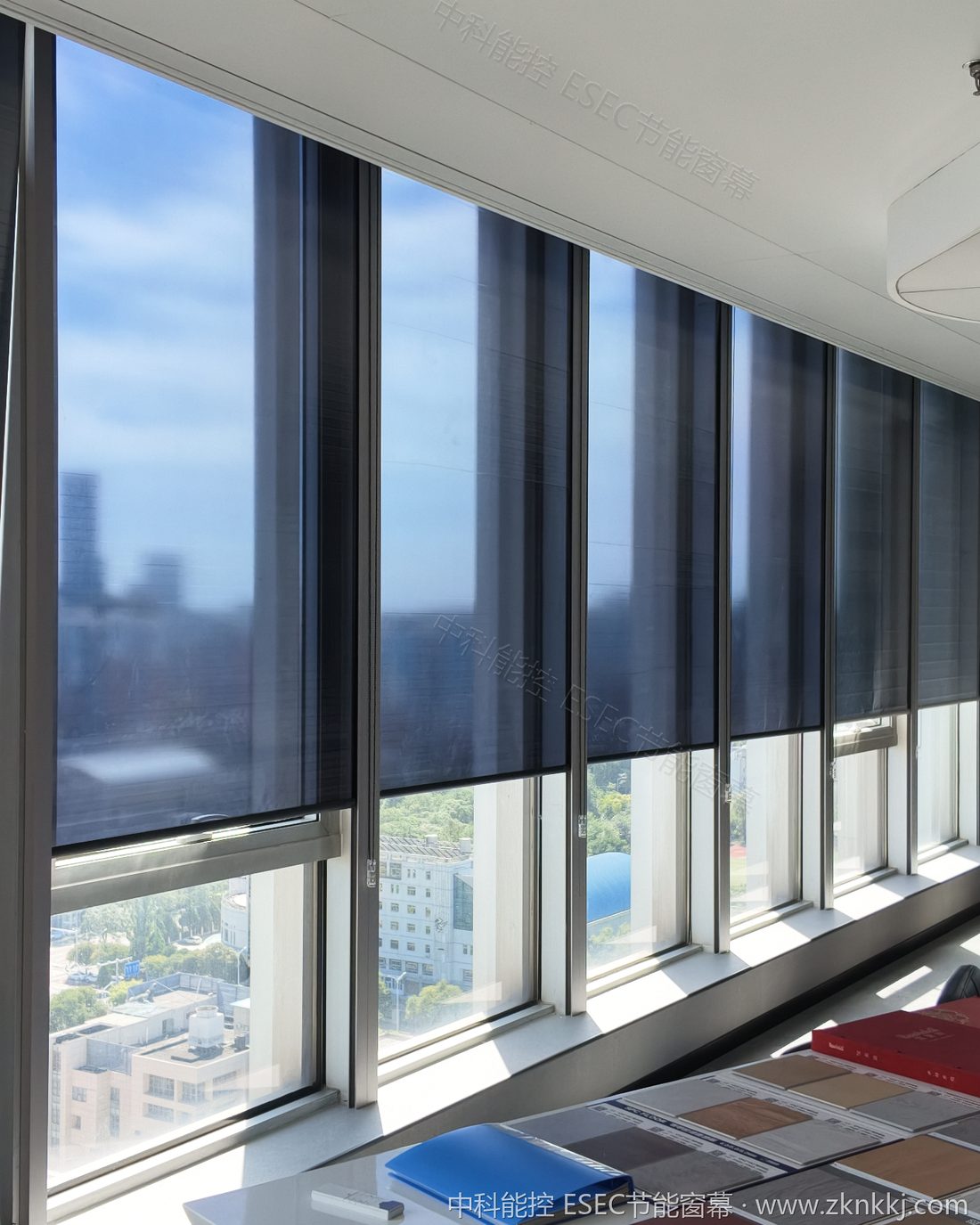 Photographed at the ESEC window curtain showroom, with multiple samples available for hands-on comparison