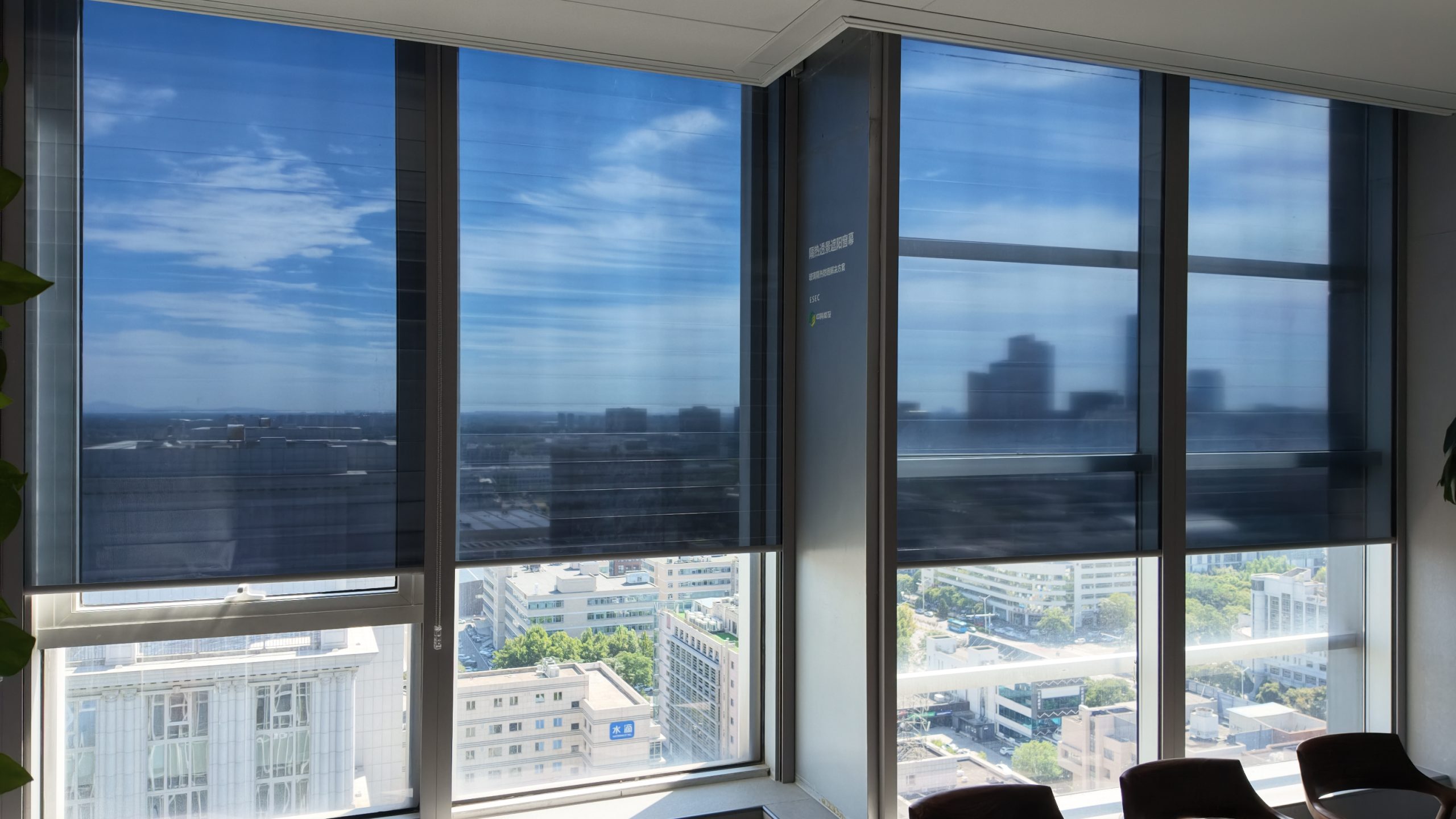 Same window, same frame: the curtained upper half shades and insulates, while the bare lower half takes direct sunlight